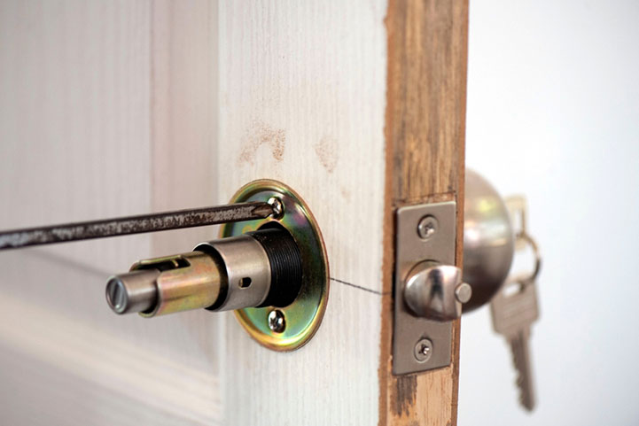 a small metal handle on a secure gate St. Charles